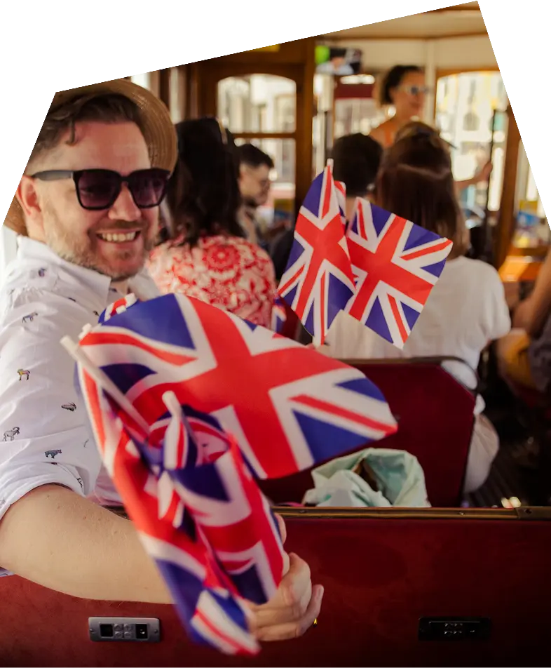 Press team with Union Jack flags